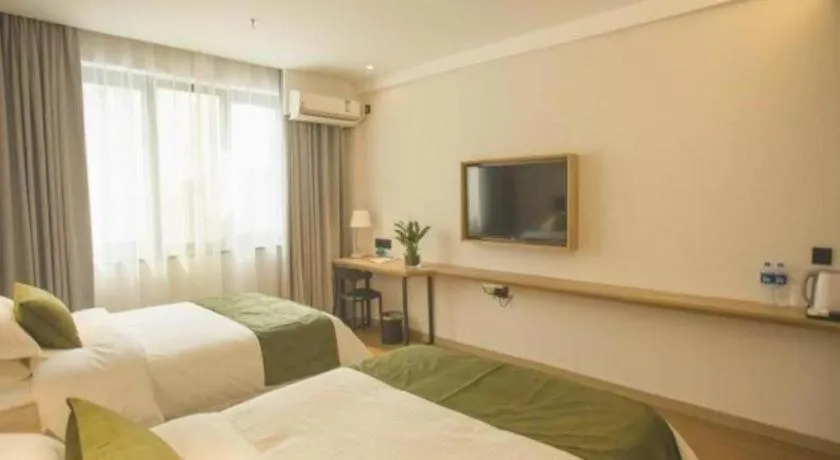 Bed in GreenTree Inn Express Taizhou Jiangyan Hardware City