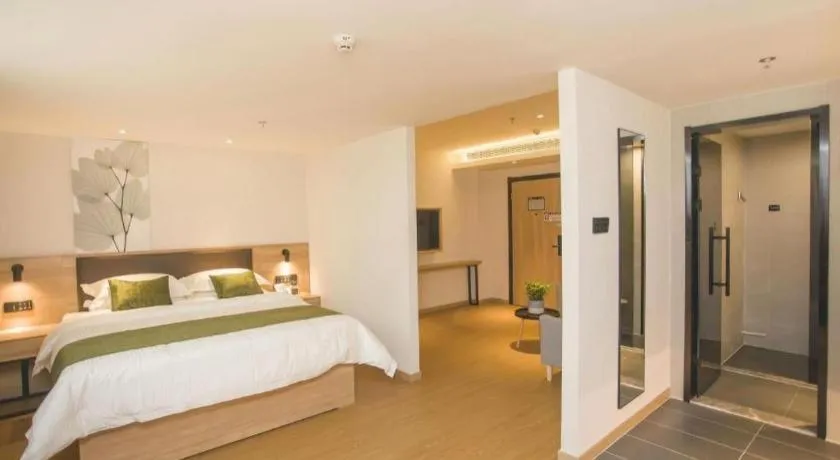 Bed in GreenTree Inn Express Taizhou Jiangyan Hardware City