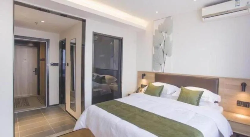 Bed in GreenTree Inn Express Taizhou Jiangyan Hardware City