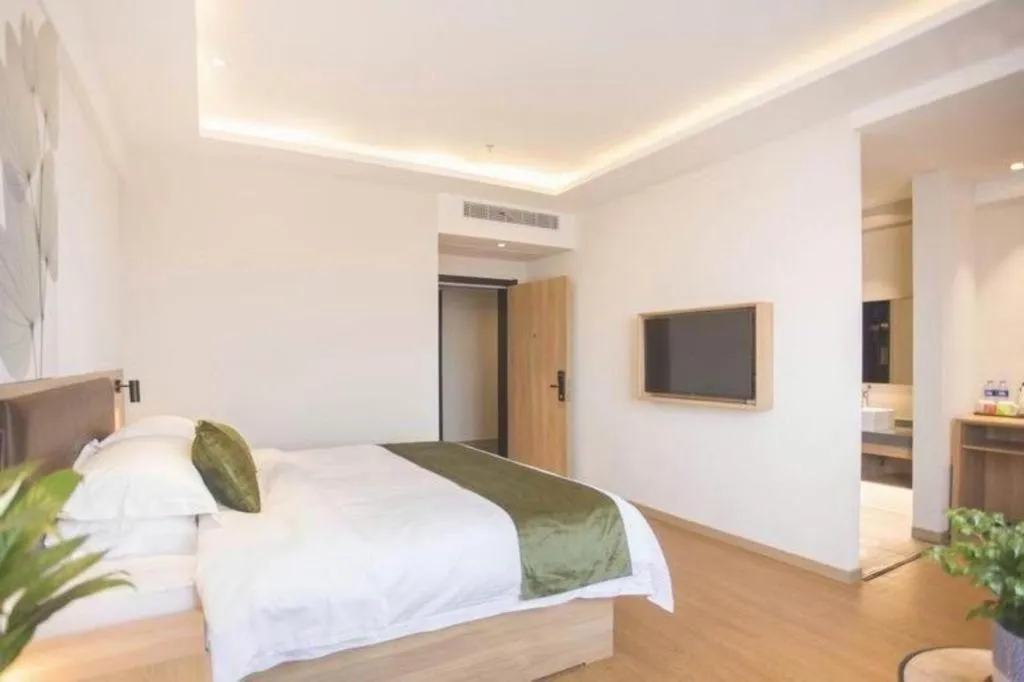 Bed in GreenTree Inn Express Taizhou Jiangyan Hardware City