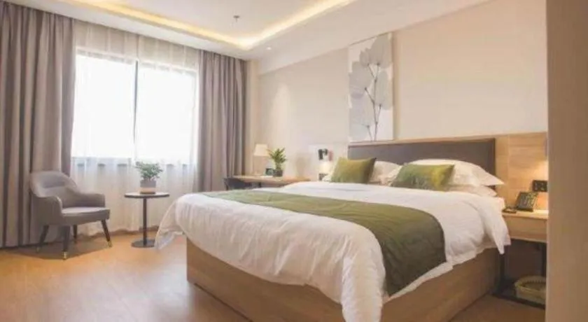 Bed in GreenTree Inn Express Taizhou Jiangyan Hardware City