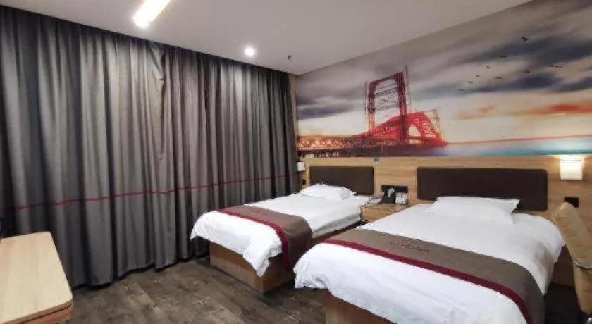 Bed in Thank Inn Hotel Anhui Fuyang Funan County Yunhe Dong Road