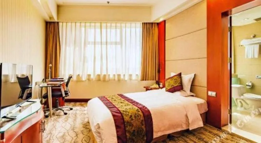Bed in Junyu Grand Hotel Qinhuangdao