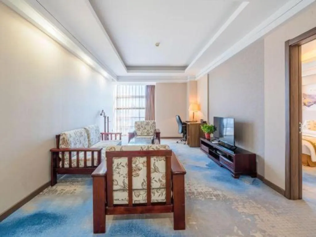 Bed in Junyu Grand Hotel Qinhuangdao