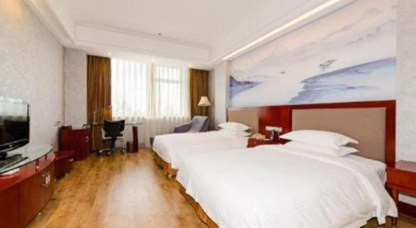 Bed in Junyu Grand Hotel Qinhuangdao
