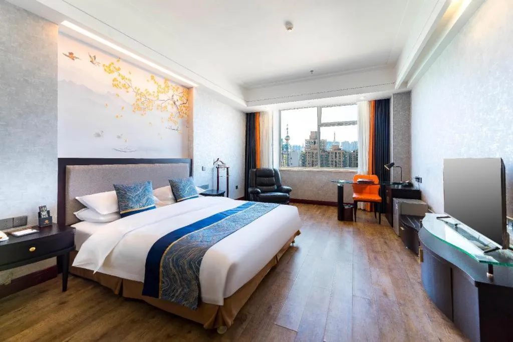 Bed in Junyu Grand Hotel Qinhuangdao