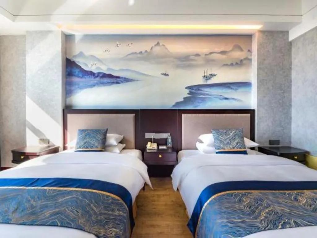 Bed in Junyu Grand Hotel Qinhuangdao