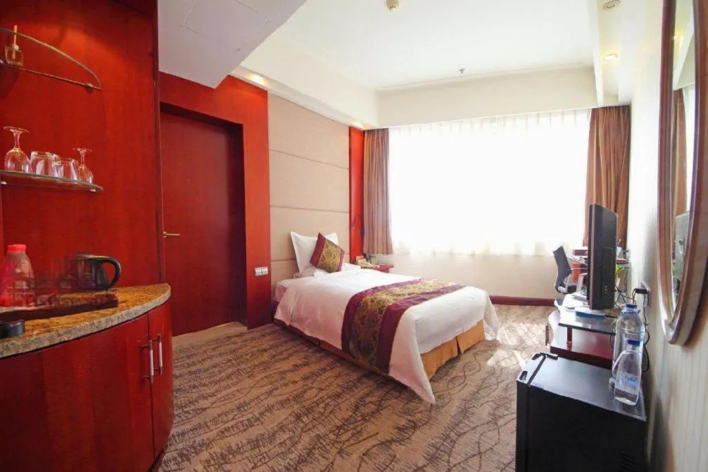 Bed in Junyu Grand Hotel Qinhuangdao