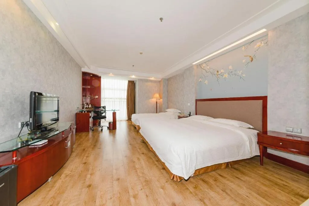 Bed in Junyu Grand Hotel Qinhuangdao