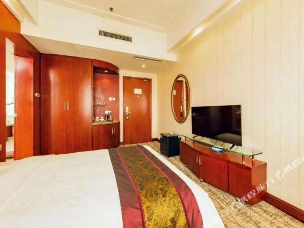 Bed in Junyu Grand Hotel Qinhuangdao