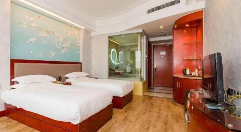 Bed in Junyu Grand Hotel Qinhuangdao