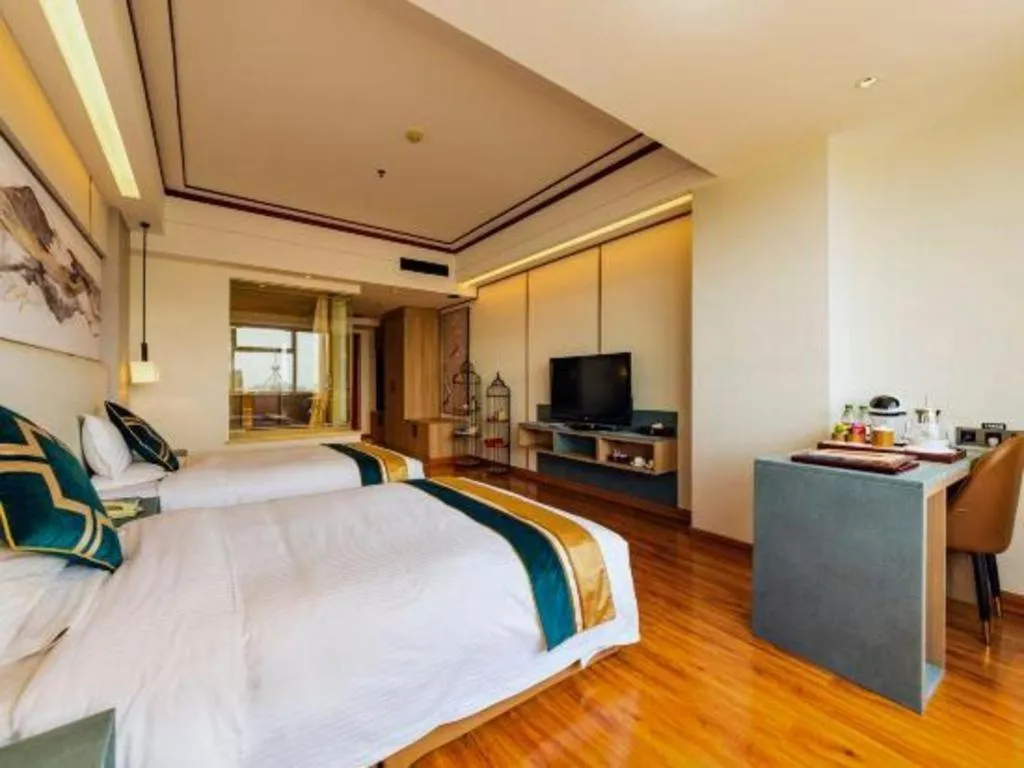 Bed in Junyu Grand Hotel Qinhuangdao