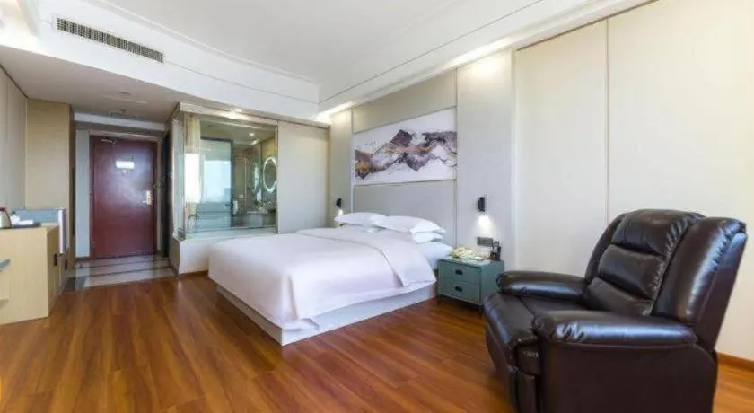 Bed in Junyu Grand Hotel Qinhuangdao