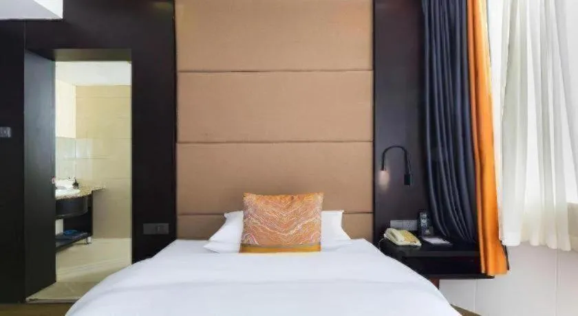 Bed in Junyu Grand Hotel Qinhuangdao