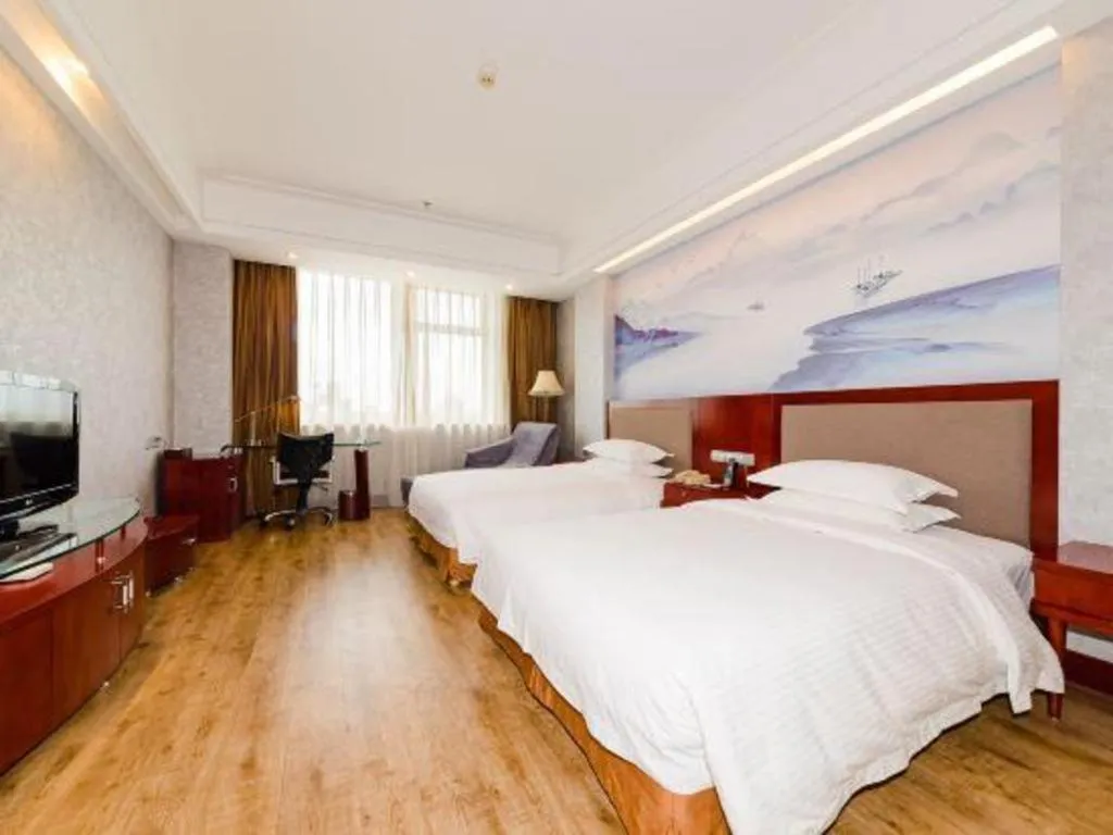 Bed in Junyu Grand Hotel Qinhuangdao