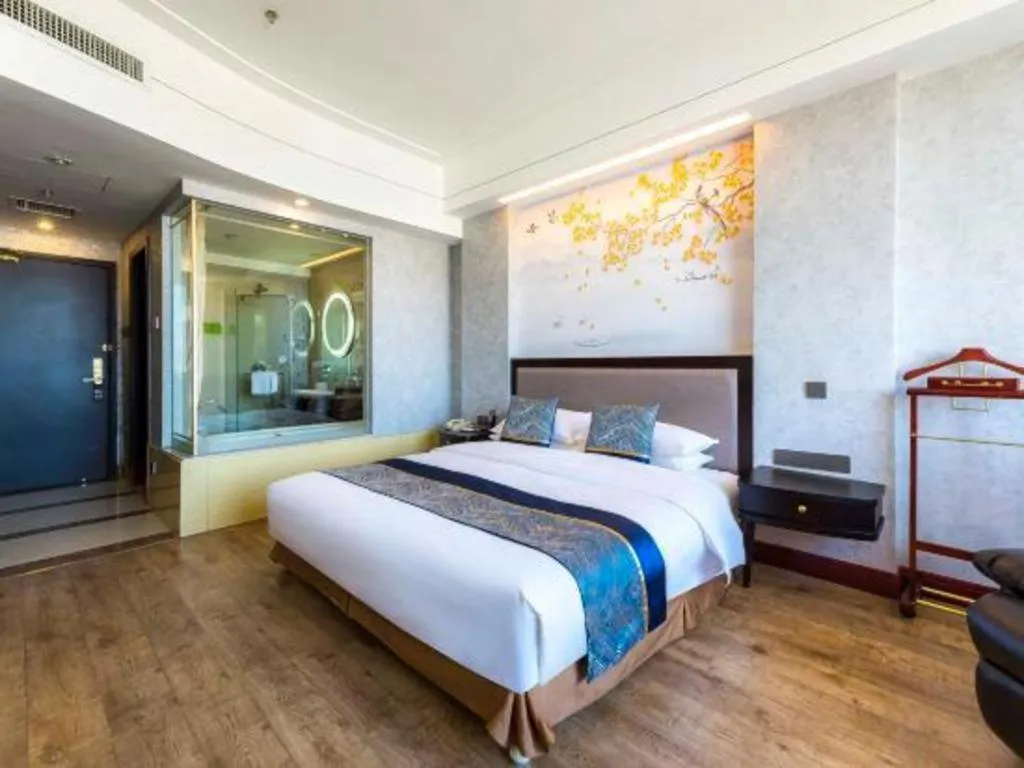 Bed in Junyu Grand Hotel Qinhuangdao