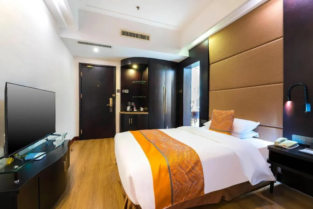 Bed in Junyu Grand Hotel Qinhuangdao