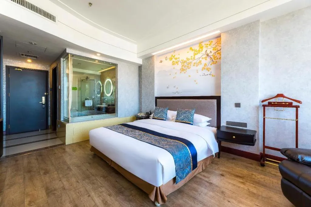 Bed in Junyu Grand Hotel Qinhuangdao