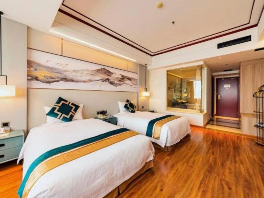 Bed in Junyu Grand Hotel Qinhuangdao