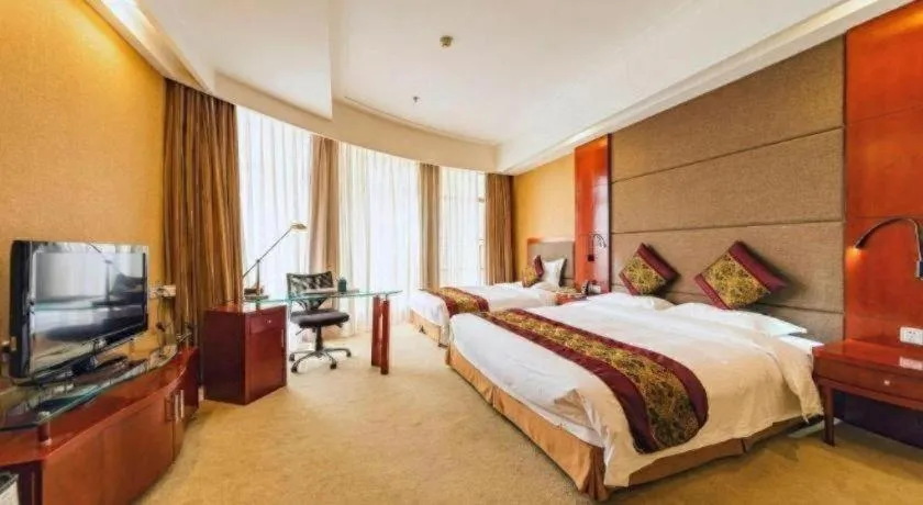 Bed in Junyu Grand Hotel Qinhuangdao