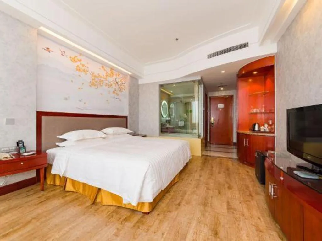 Bed in Junyu Grand Hotel Qinhuangdao