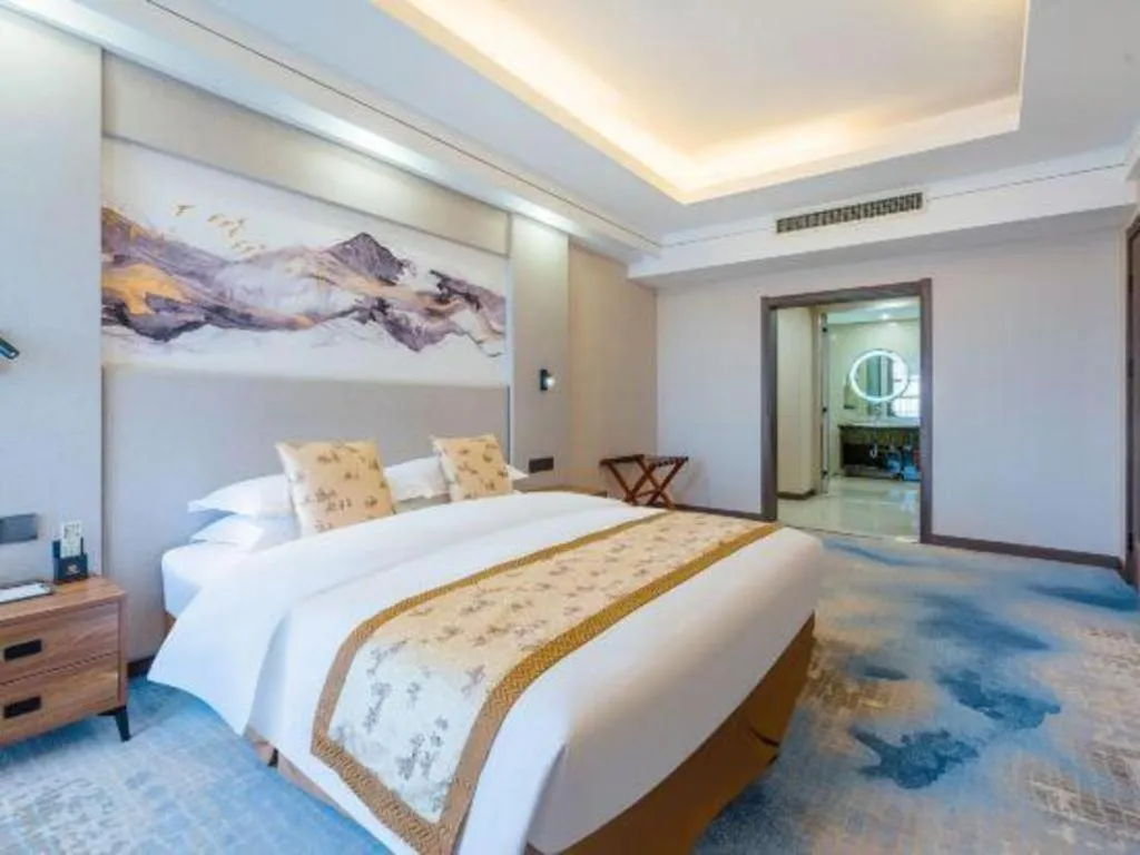 Bed in Junyu Grand Hotel Qinhuangdao
