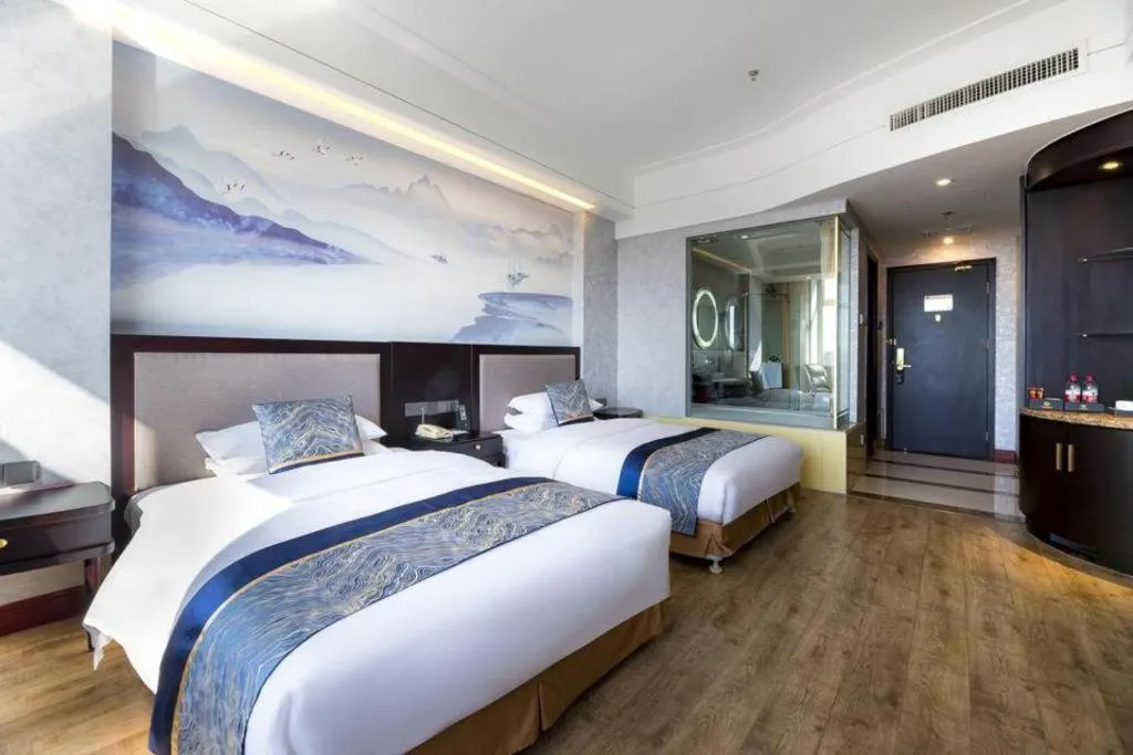Bed in Junyu Grand Hotel Qinhuangdao