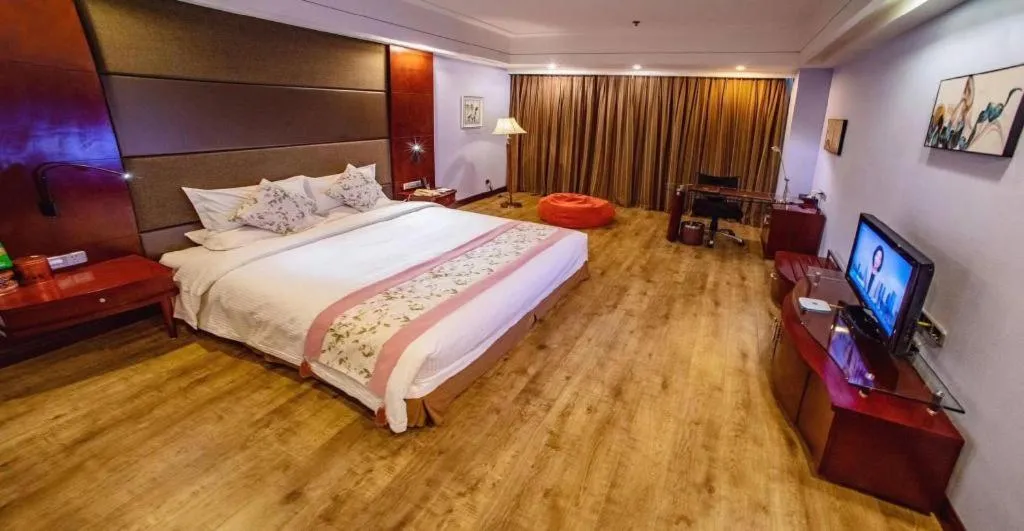 Bed in Junyu Grand Hotel Qinhuangdao