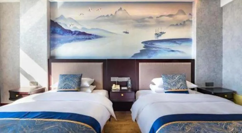 Bed in Junyu Grand Hotel Qinhuangdao