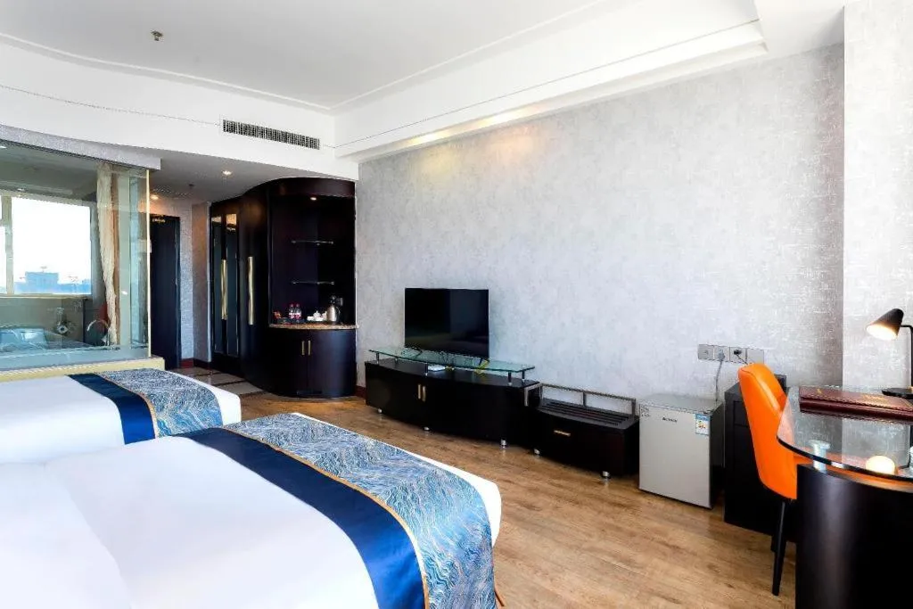 Bed in Junyu Grand Hotel Qinhuangdao