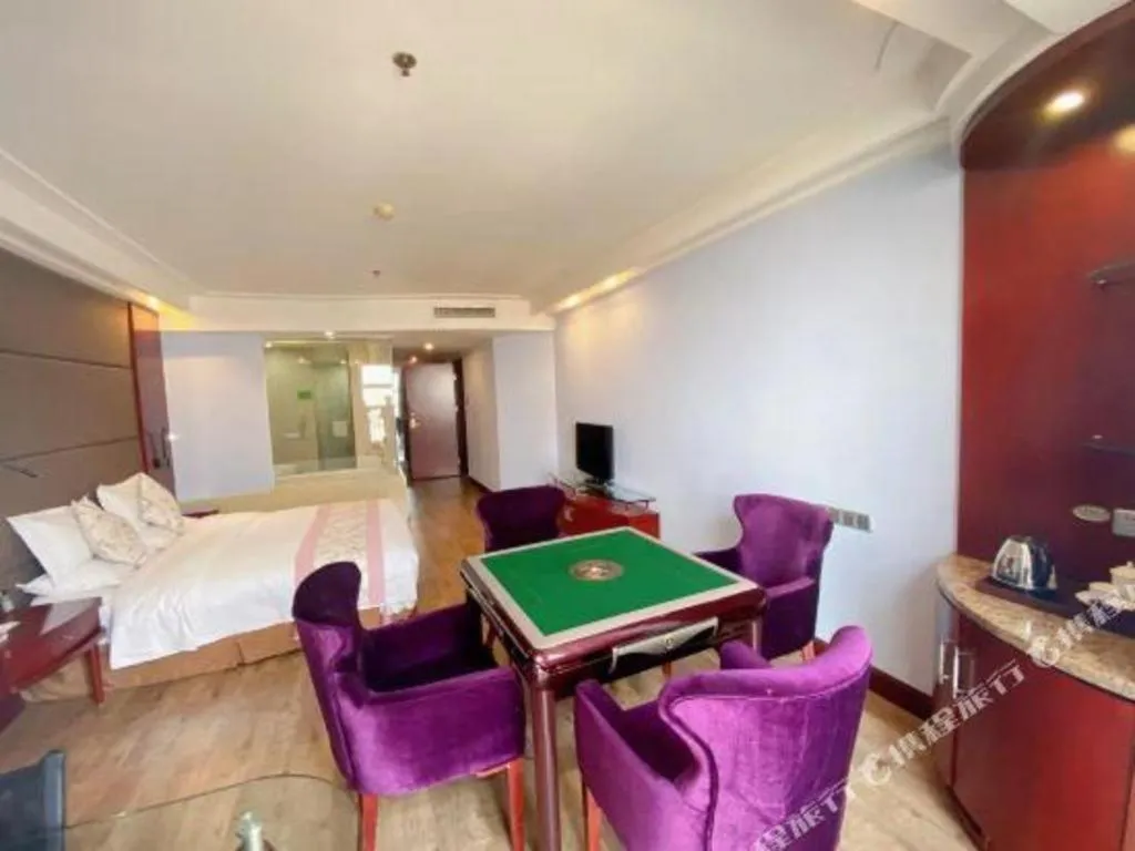 Bed in Junyu Grand Hotel Qinhuangdao