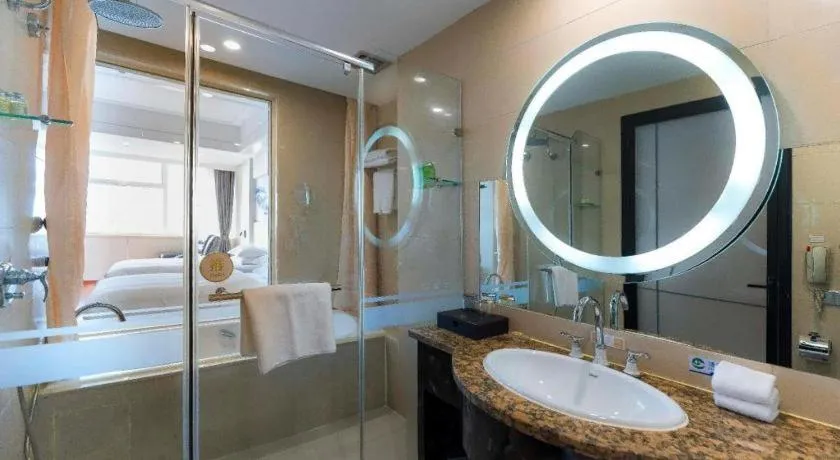 Bed in Junyu Grand Hotel Qinhuangdao