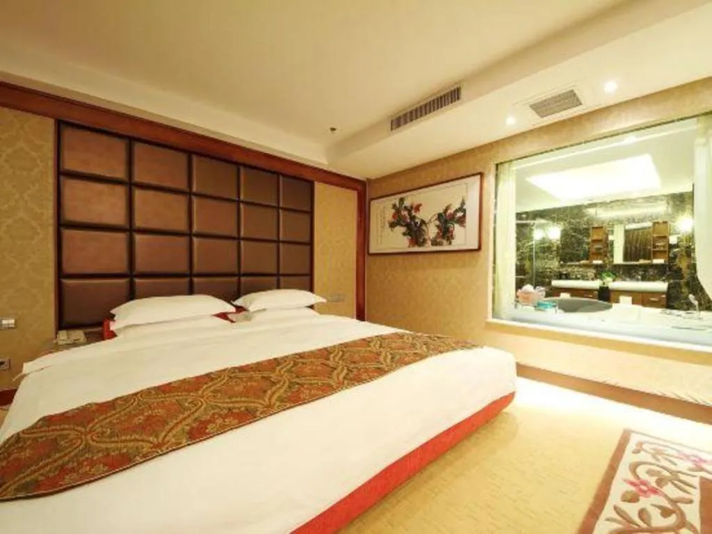 Bed in Junyu Grand Hotel Qinhuangdao