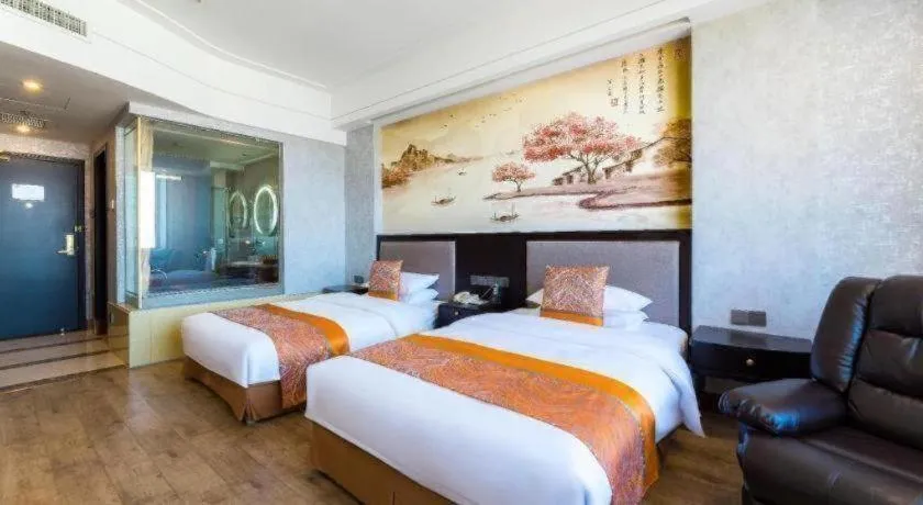 Bed in Junyu Grand Hotel Qinhuangdao