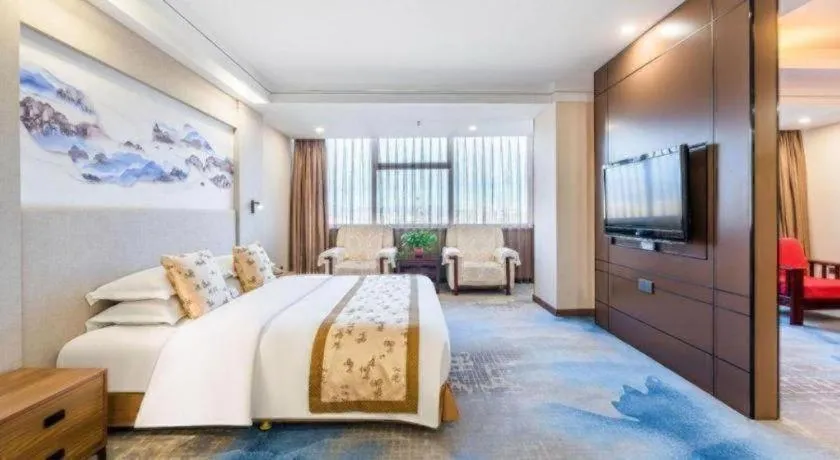 Bed in Junyu Grand Hotel Qinhuangdao