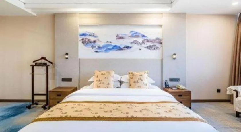 Bed in Junyu Grand Hotel Qinhuangdao