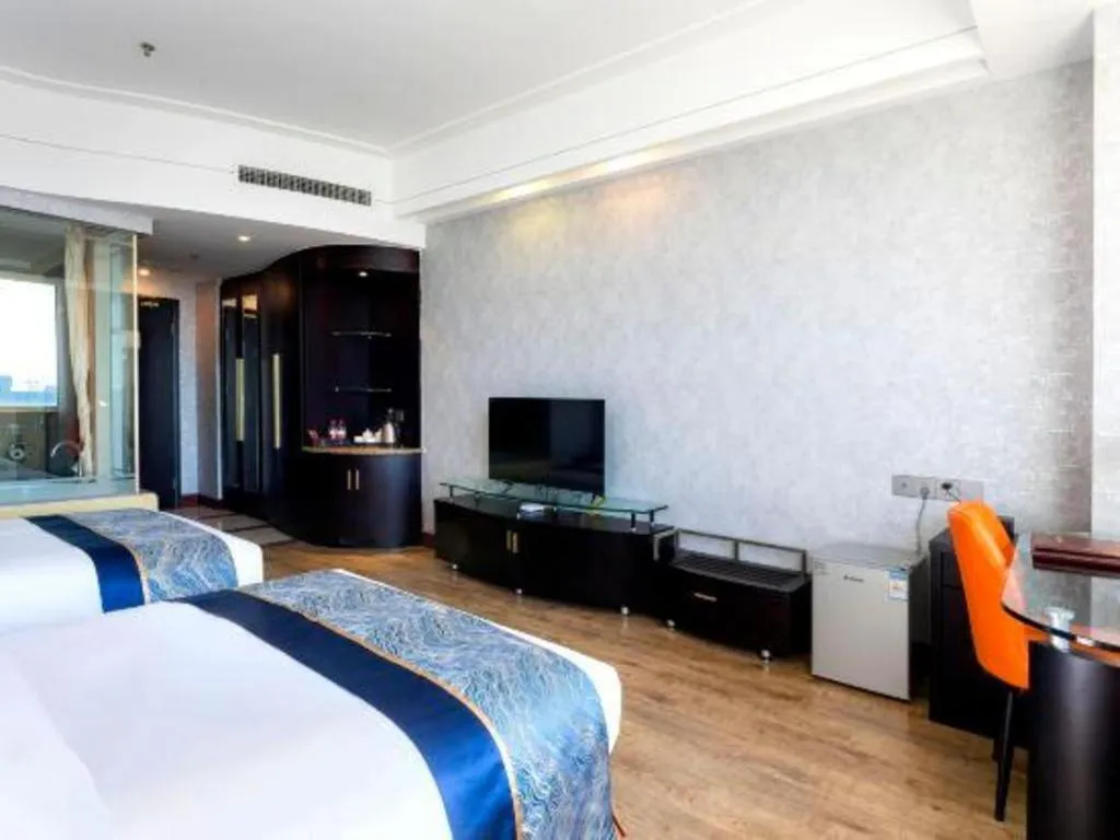 Bed in Junyu Grand Hotel Qinhuangdao