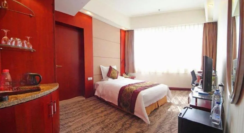 Bed in Junyu Grand Hotel Qinhuangdao