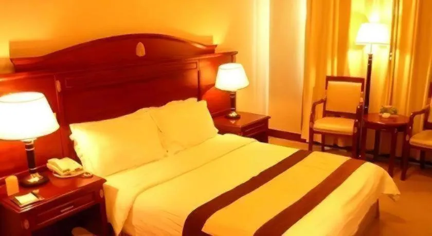 Bed in Heilongjiang Kunlun Hotel