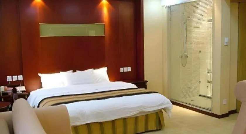 Bed in Heilongjiang Kunlun Hotel