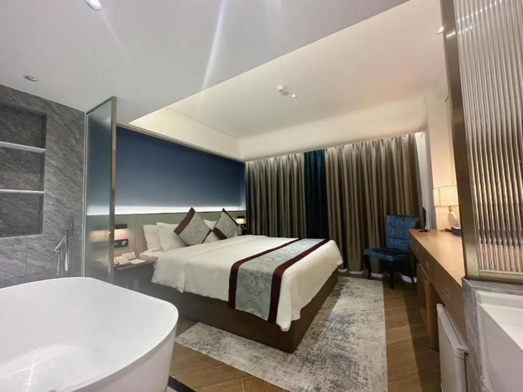 Bed in Xinyuan Hot Spring Hotel