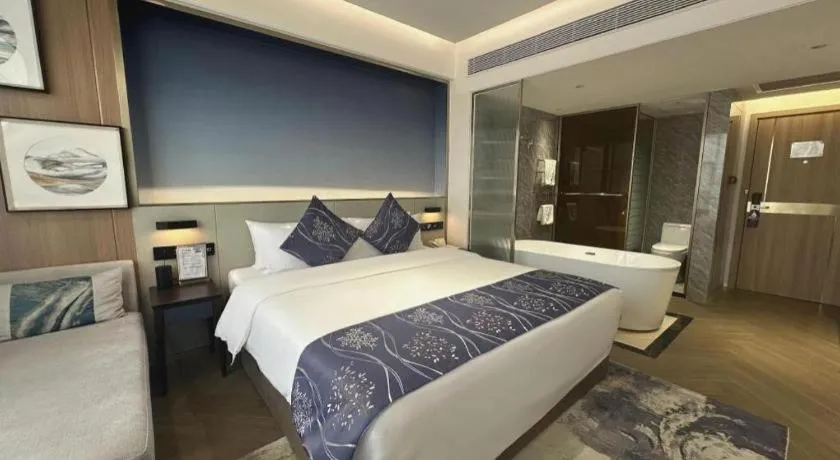 Bed in Xinyuan Hot Spring Hotel