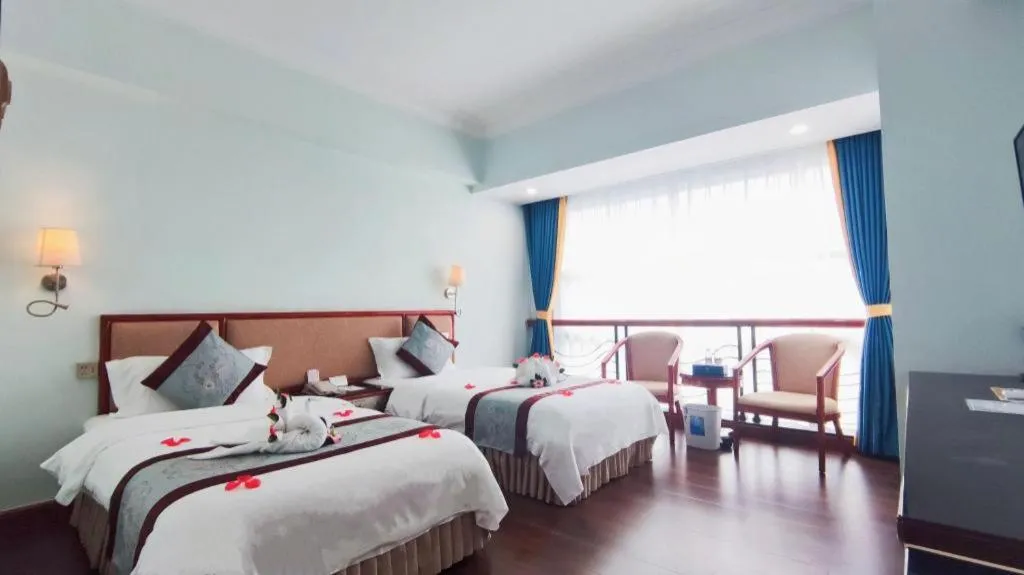Bed in Xinyuan Hot Spring Hotel