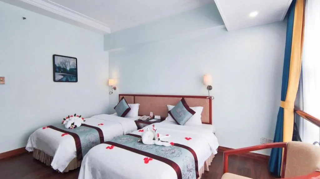 Bed in Xinyuan Hot Spring Hotel