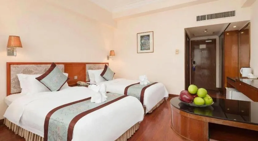 Bed in Xinyuan Hot Spring Hotel