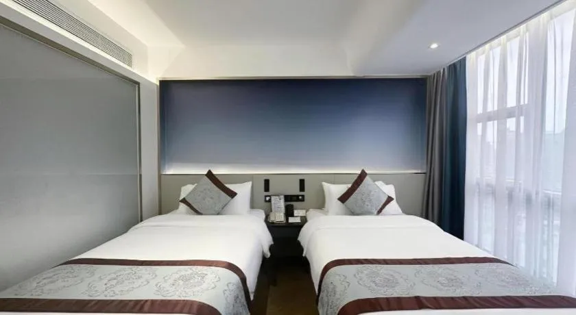 Bed in Xinyuan Hot Spring Hotel