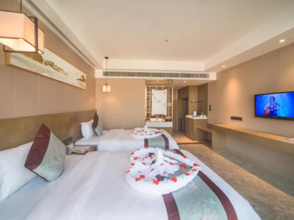 Bed in Xinyuan Hot Spring Hotel
