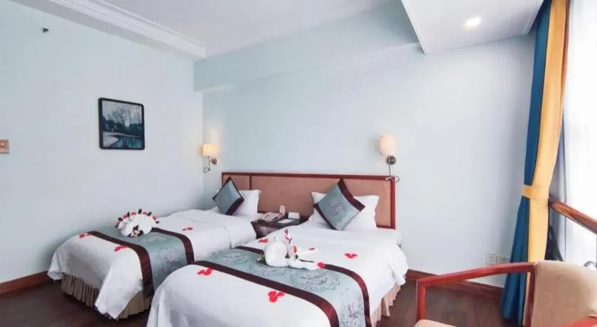 Bed in Xinyuan Hot Spring Hotel