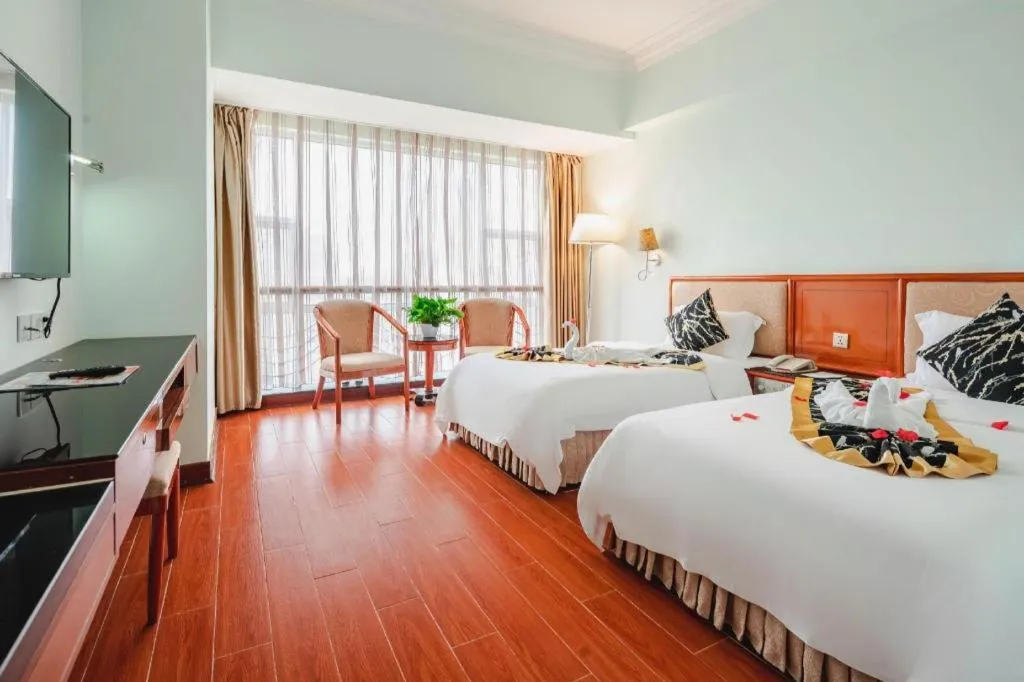 Bed in Xinyuan Hot Spring Hotel