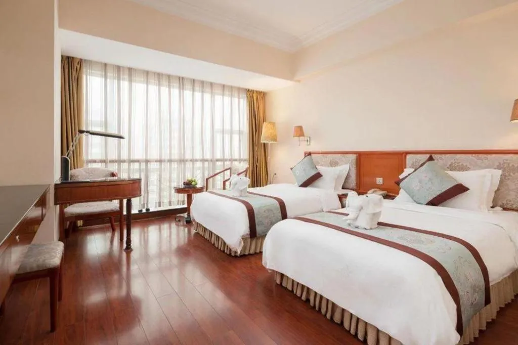 Bed in Xinyuan Hot Spring Hotel